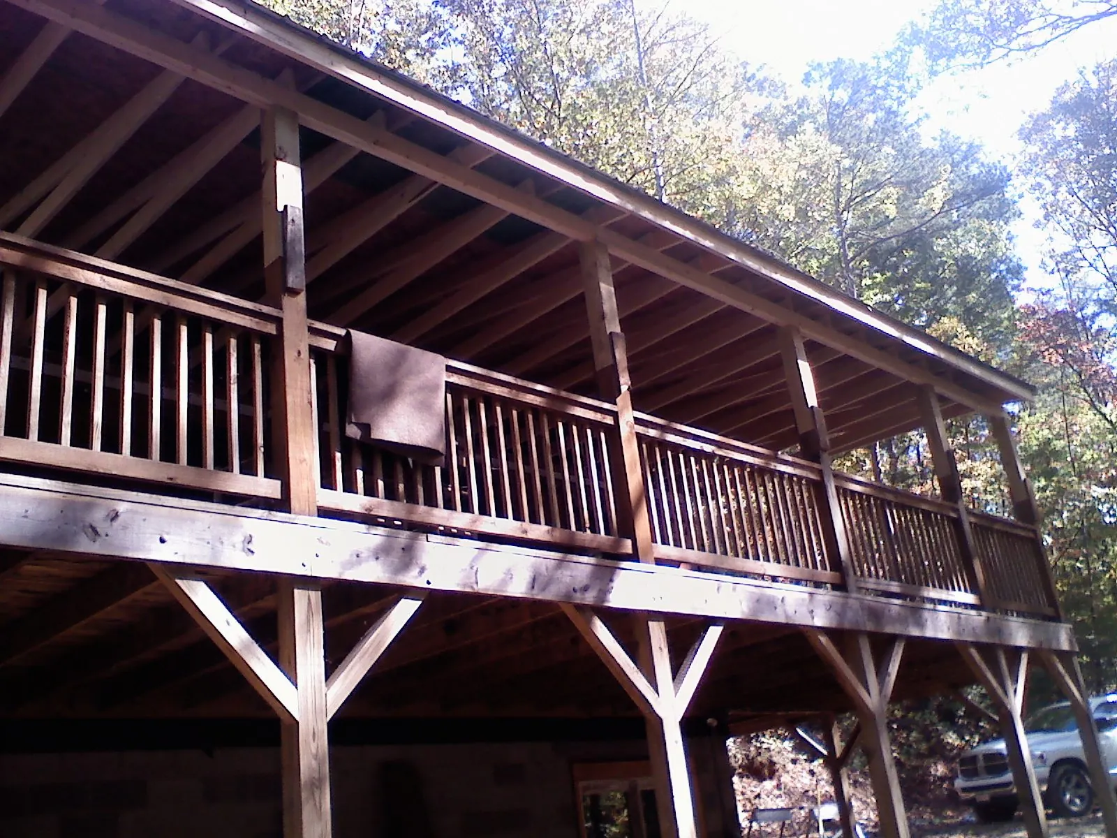 Timber framing under a new elevated porch and deck — Roof Leak Repair in East Rockaway by Roofing Brothers